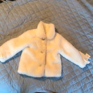 Little girl’s fur coat